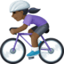 🚴🏿‍♀️ woman biking: dark skin tone display on Facebook